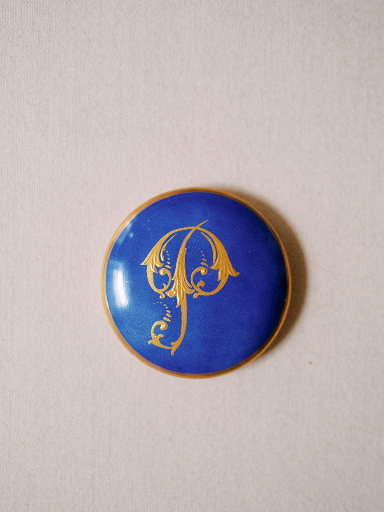 Gilded "P" Porcelain Piece