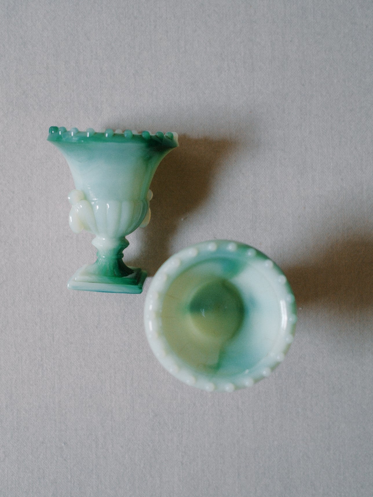 Set of Two Green Glass Urns