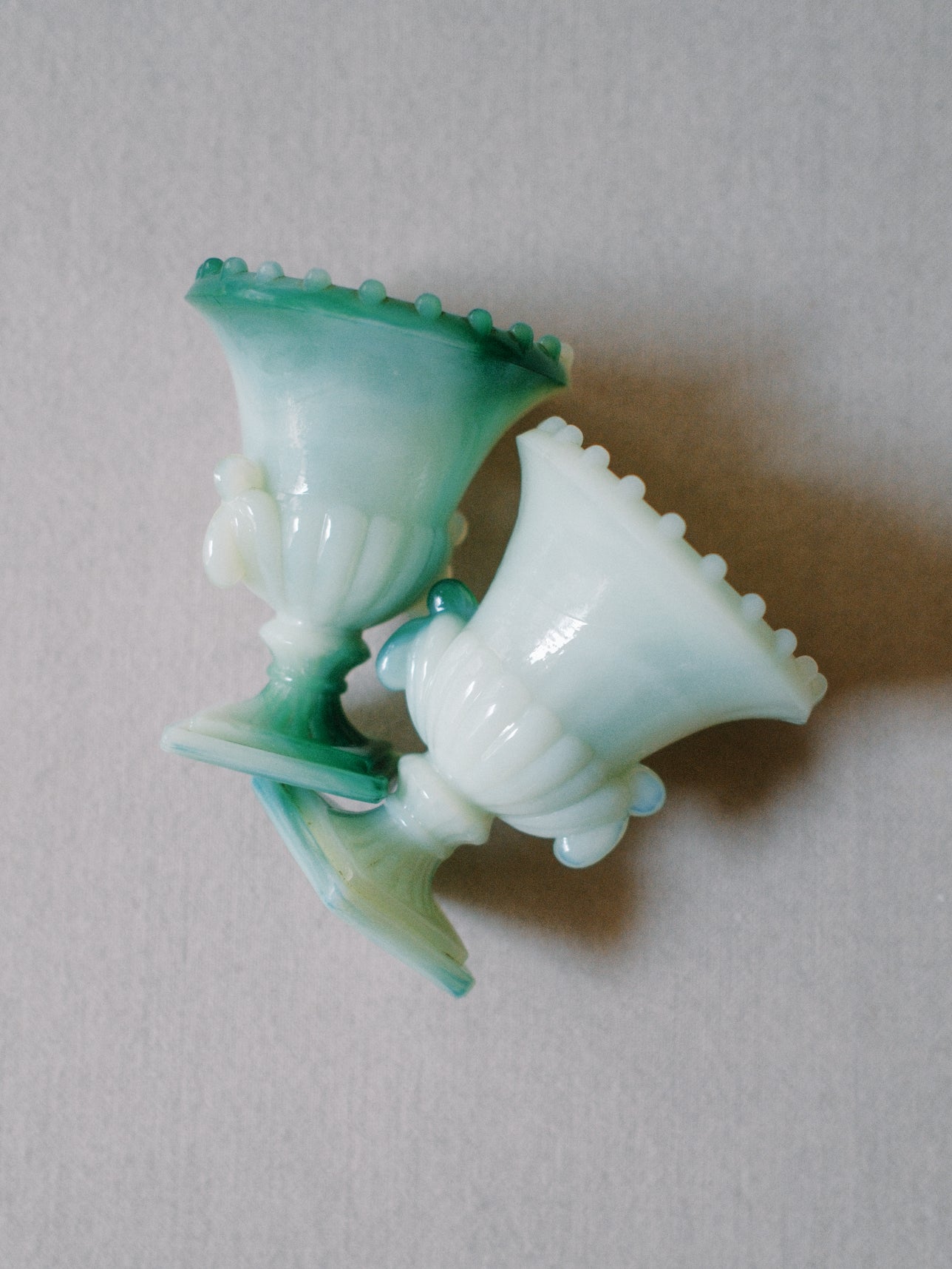 Set of Two Green Glass Urns