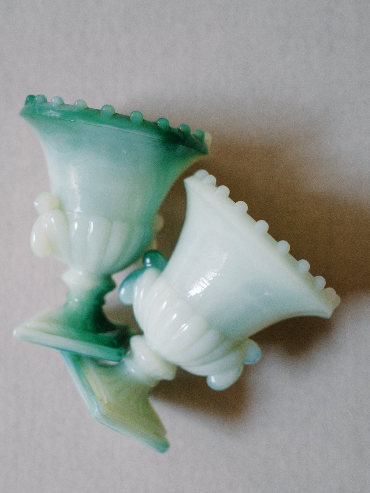 Set of Two Green Glass Urns