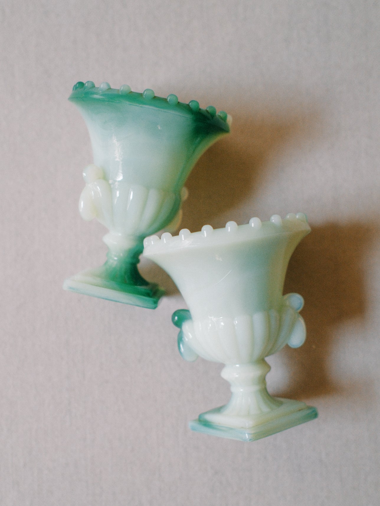 Set of Two Green Glass Urns
